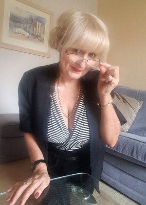 18 year old female boxer Sabrina Blond covers up her naked tits